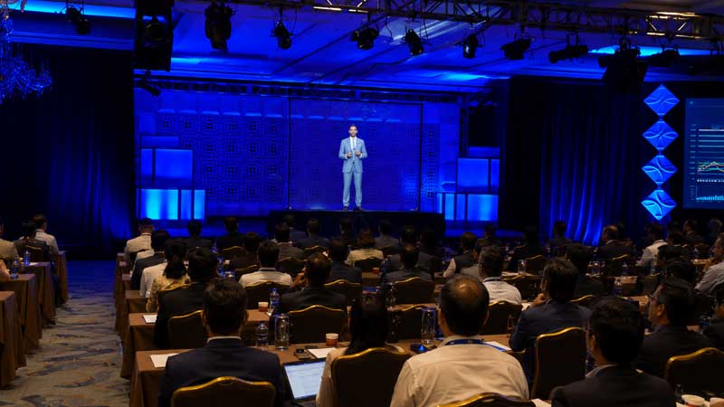 High transparency Holo Mesh Screen allowing clear stage visibility at international summit